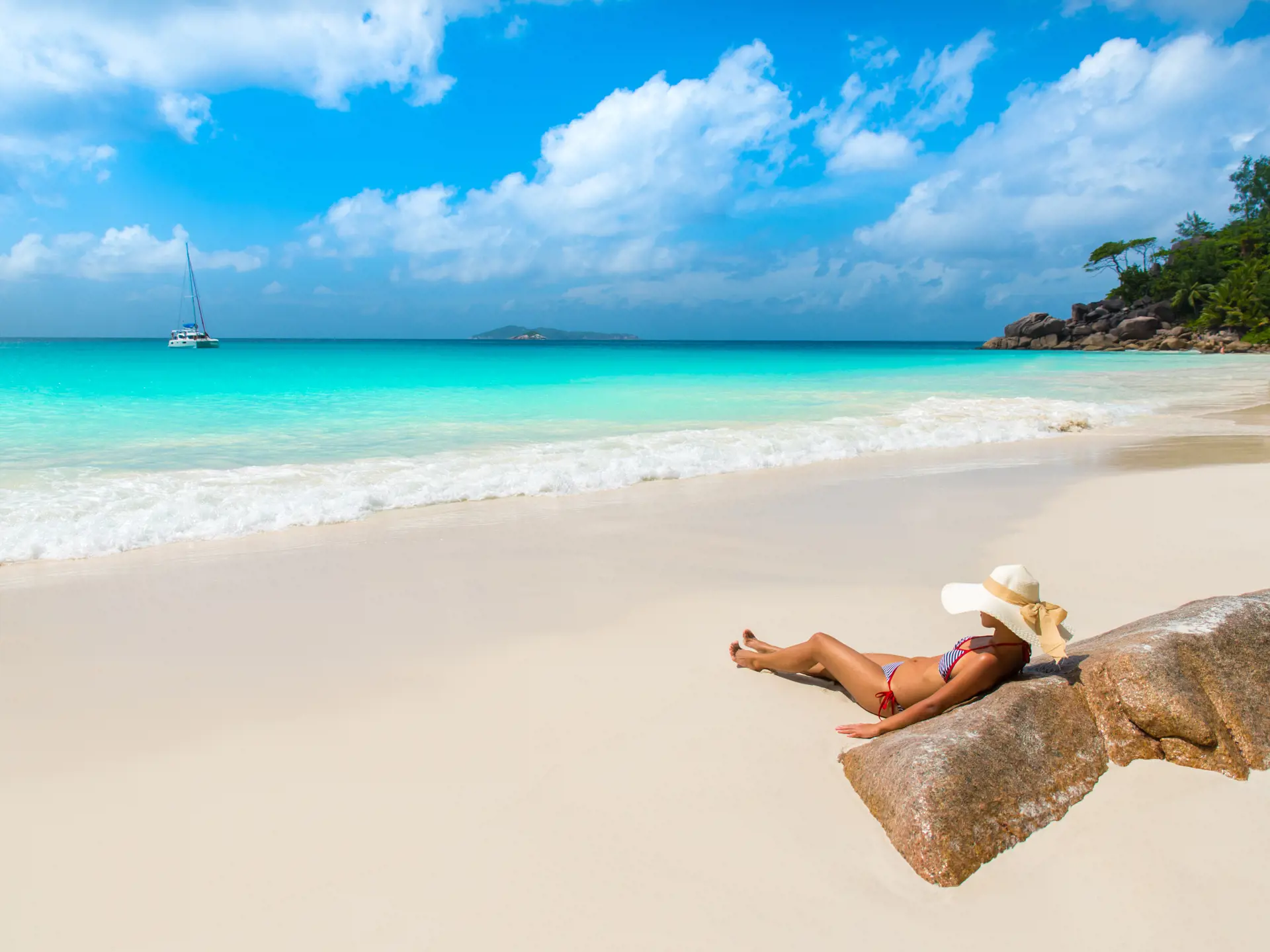 shutterstock_281499635 Girl at beautiful beach - Anse Georgette - Island Praslin at Seychelles.jpg